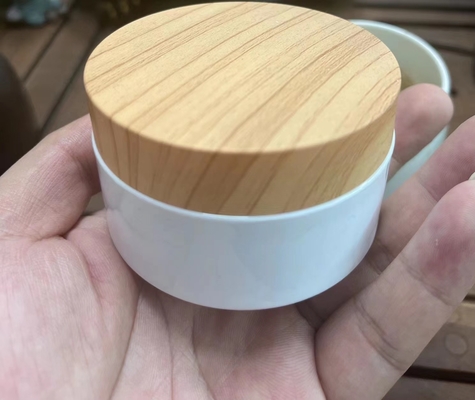 Bambú de madera plástico del tarro de la crema de la cubierta 100ml 200ml del grano para el OEM cosmético